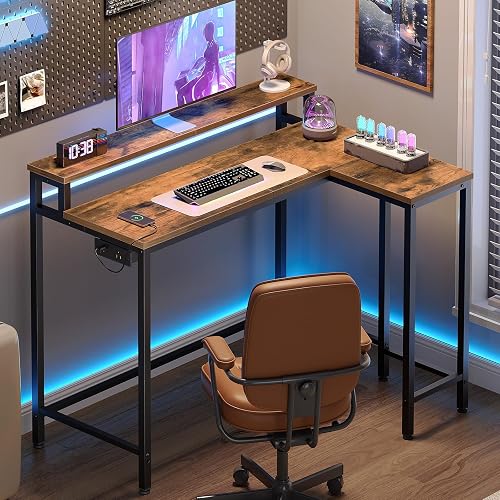 YATINEY L-Shaped Small Computer Desk with Power Outlets, Small Gaming Desk with Monitor Stand, Reversible Home Office Desk for Study, Gaming Room, Living Room, Rustic Brown DN05UBR