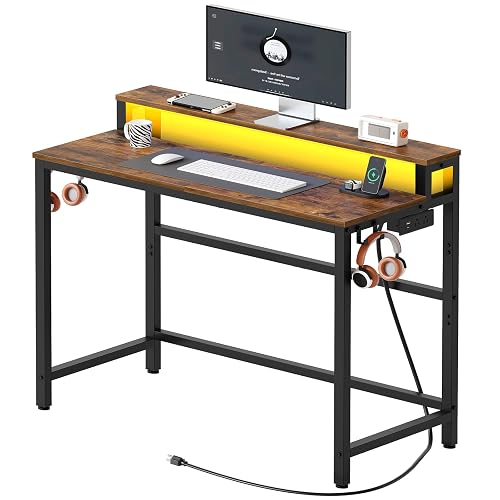 YATINEY Small Computer Desk with Charging Station and LED Lights, Gaming Desk with Monitor Stand, 2-Tier Home Office Desk with 4 Side Hooks, for Living Room, Home Office, Rustic Brown DN01UDBRY2