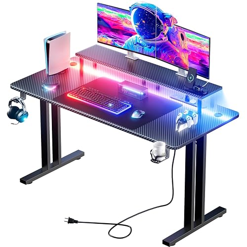 HLDIRECT 63 Inch Gaming Desk with LED Lights & Cable Management, Black | Ergonomic carbon fiber gaming computer desk with 5 sockets, monitor stand, cup holder, headphone hook & mouse pad for gamers