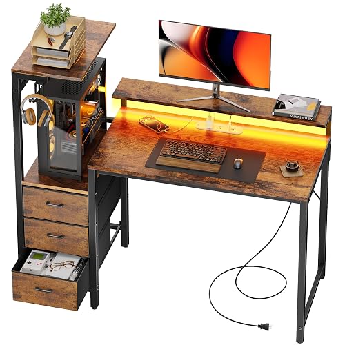 HLDIRECT 44 Inch Gaming Desk with Power Outlets & LED Lights, Rustic Brown | Reversible gaming computer desk with built-in monitor stand, 3 fabric drawers & 4 side hooks, 2 AC outlets & 3 USB ports